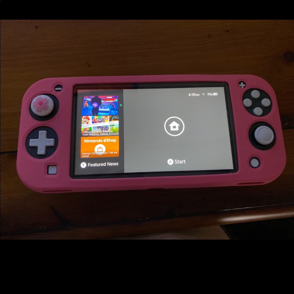 Nintendo Switch Lite W/ Mario Kart Deluxe 8